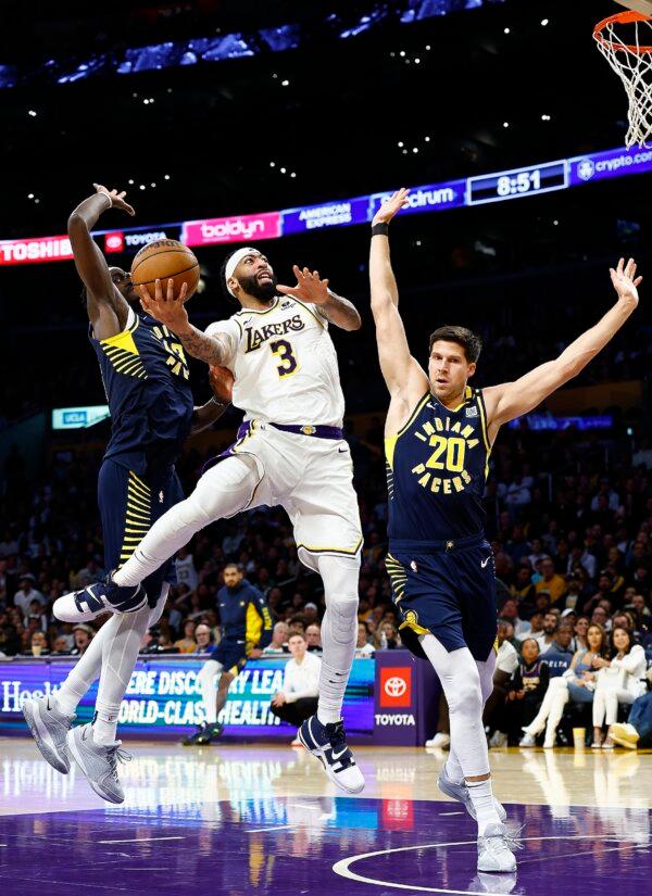 Anthony Davis (3) of the Los Angeles Lakers takes a shot against Doug McDermott (20) of the Indiana Pacers in the second half in Los Angeles on March 24, 2024. (Ronald Martinez/Getty Images)