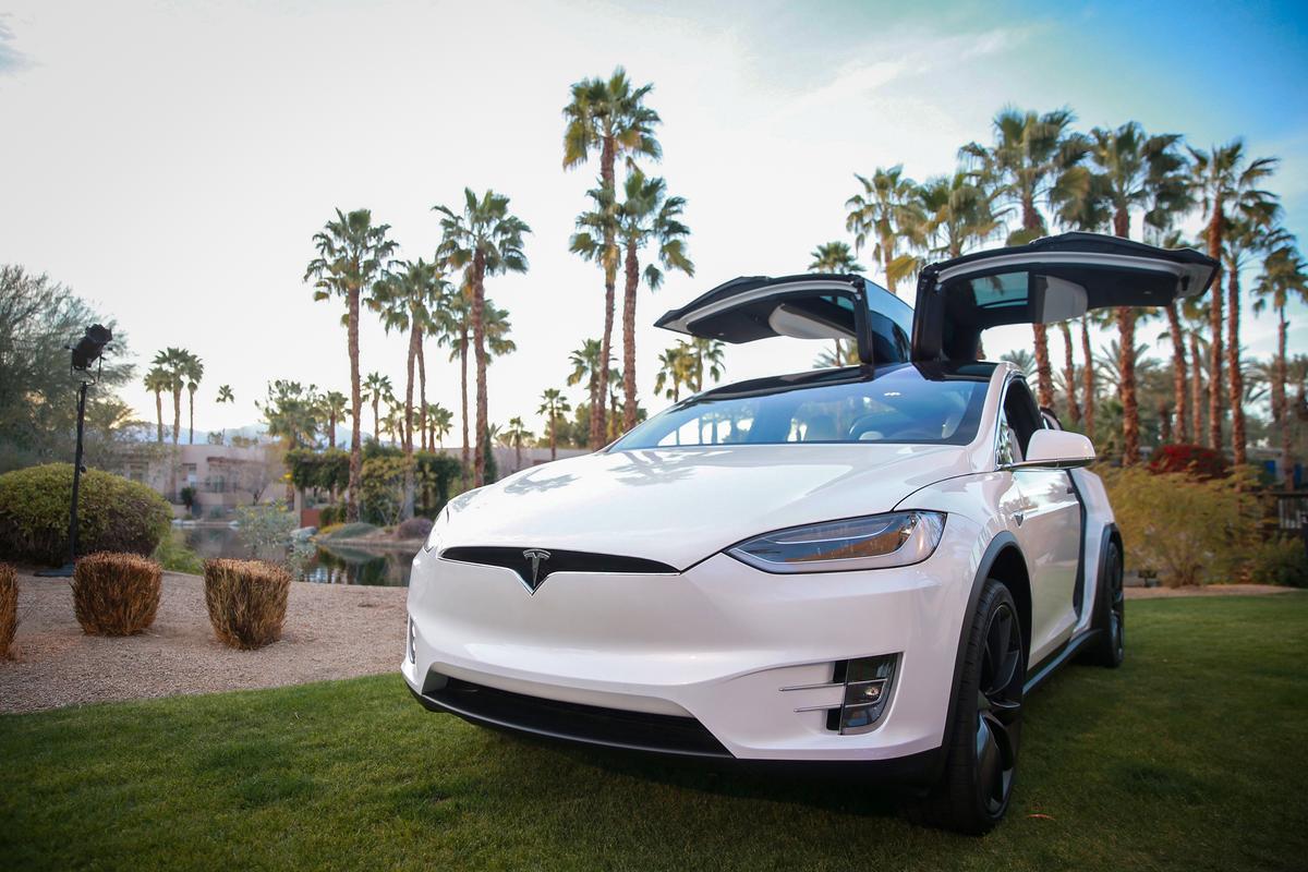 A Tesla Model X is displayed during an event in Indian Wells, Calif., on March 5, 2018. (Rich Fury/Getty Images for AYS Sports Marketing)