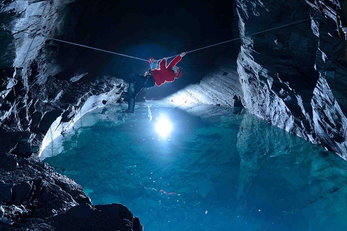 An underground blue lake in the mine. (Courtesy of <a href="https://www.go-below.co.uk/">Go Below Underground Adventures</a>)