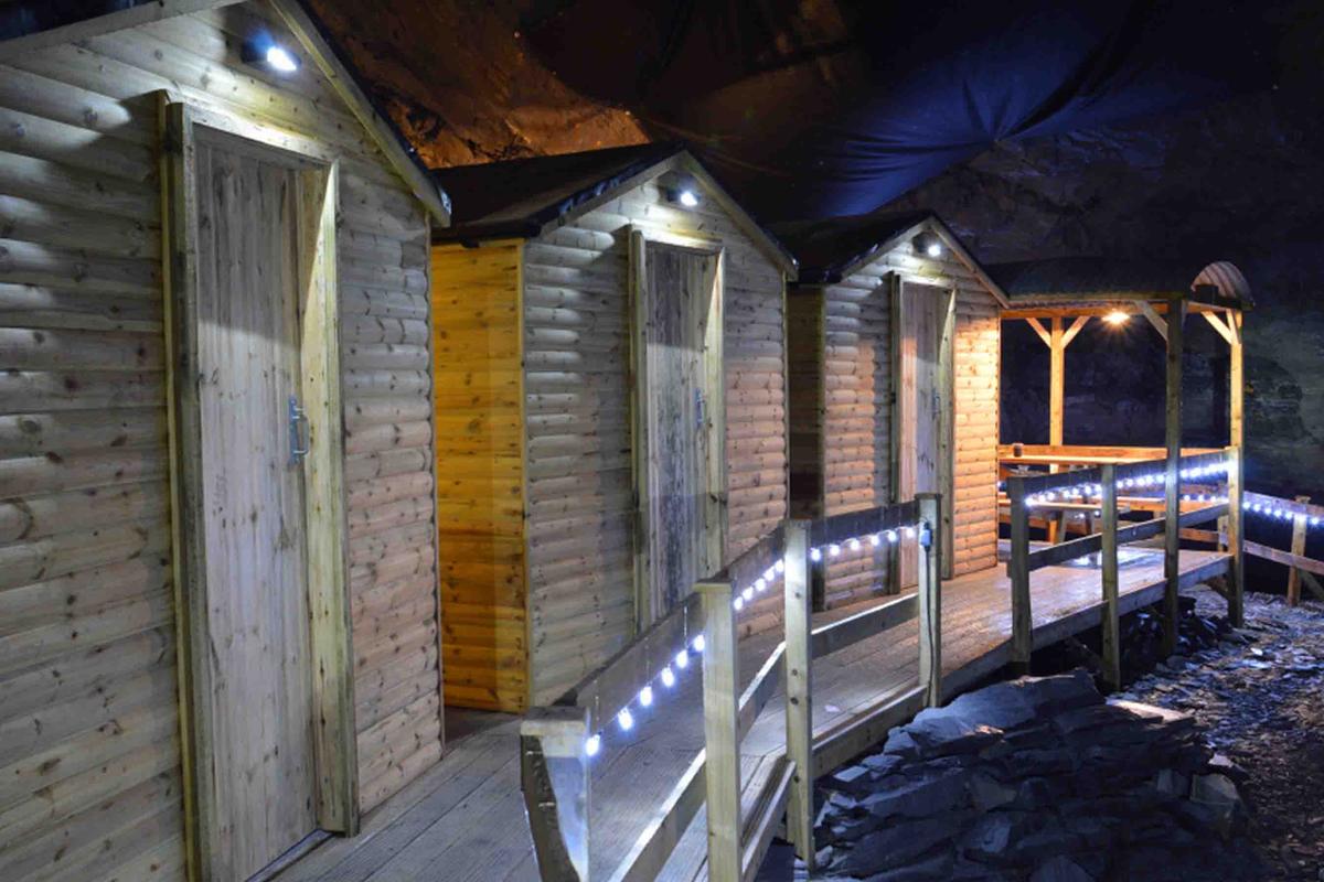 Cabins 1,375 feet underground in the old quarry. (Courtesy of <a href="https://www.go-below.co.uk/">Go Below Underground Adventures</a>)