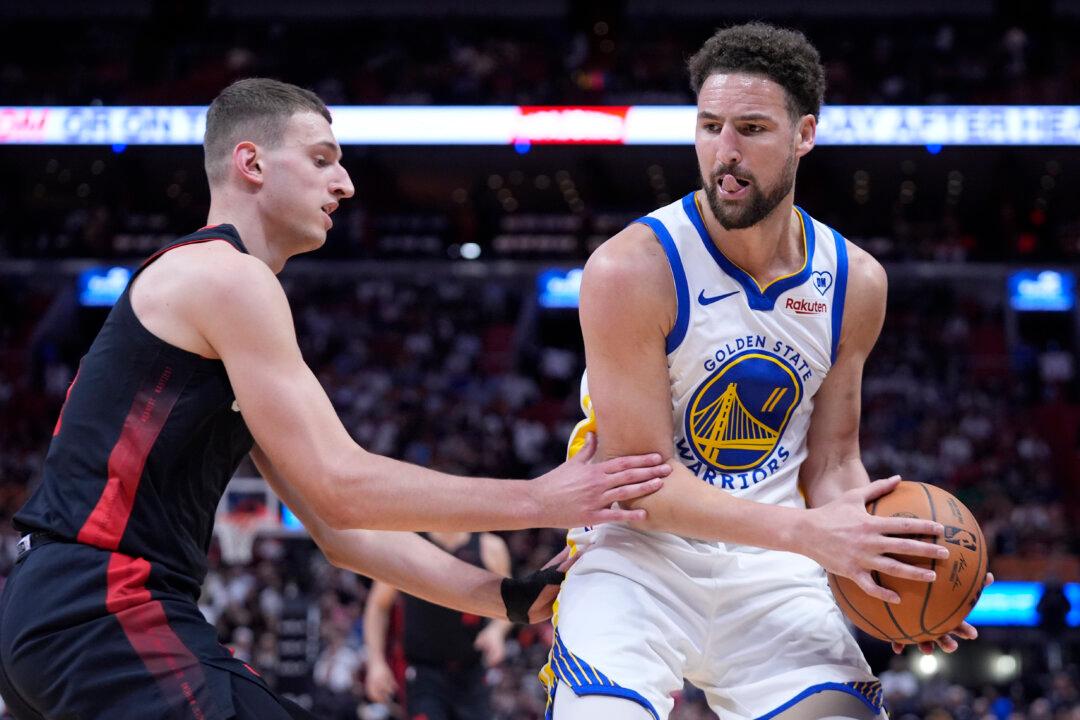 Thompson’s 28 Points Help Warriors Pull Away Late in Road Win Over Heat