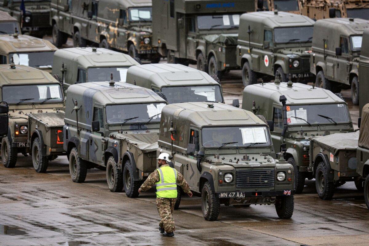 Military vehicles, including trucks and support vehicles, all belonging to the 7 Light Mechanised Brigade unit of the British Army, aka "The Desert Rats," at the Marchwood Military Sea Mounting Centre near Southampton, England, on Feb. 13, 2024. (Adrian Dennis/AFP via Getty Images)