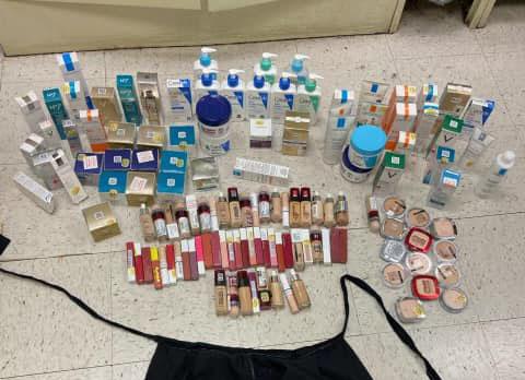 Items included creams, lip glosses, foundation, and pressed powder. (Irvine Police Department)