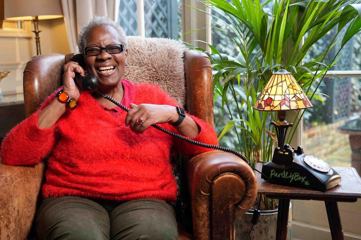 A phone line is being trialed for young people to get advice and guidance from the elderly. (SWNS)