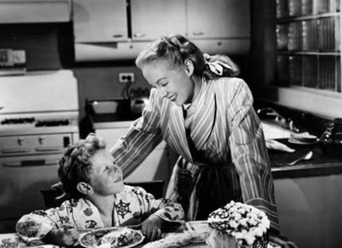 Tommy Bassett (Jimmy Hunt) with Millie McGonigle (Evelyn Keyes), in “The Mating of Millie.” (Columbia Pictures)