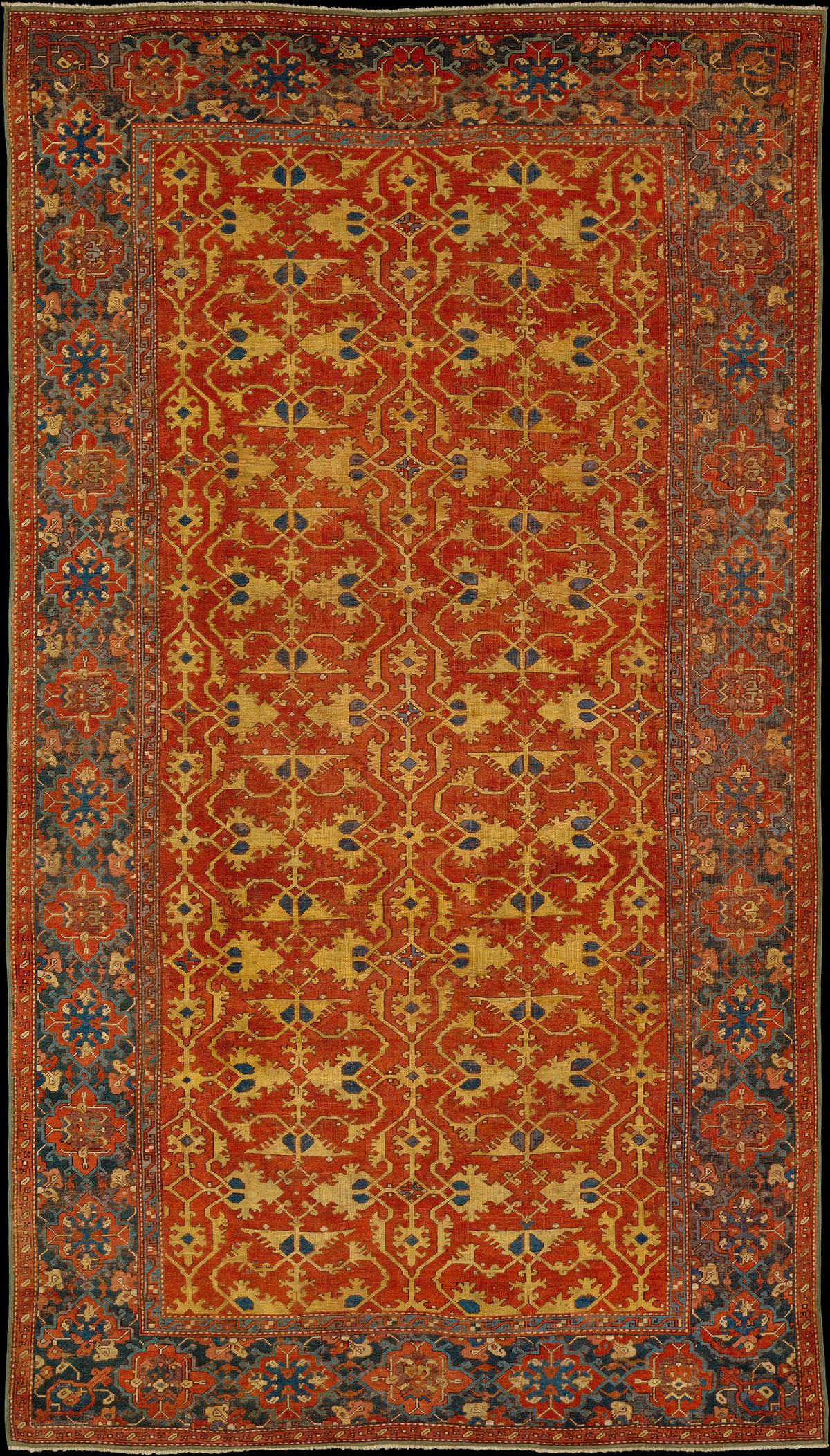 "Lotto" carpets are characterized by yellow arabesque motifs on a red background. "Lotto" Carpet, circa 1600, attributed to Turkey. Wool; 121 1/4 inches by 69 1/4 inches. The Metropolitan Museum of Art, New York City. (Public Domain)