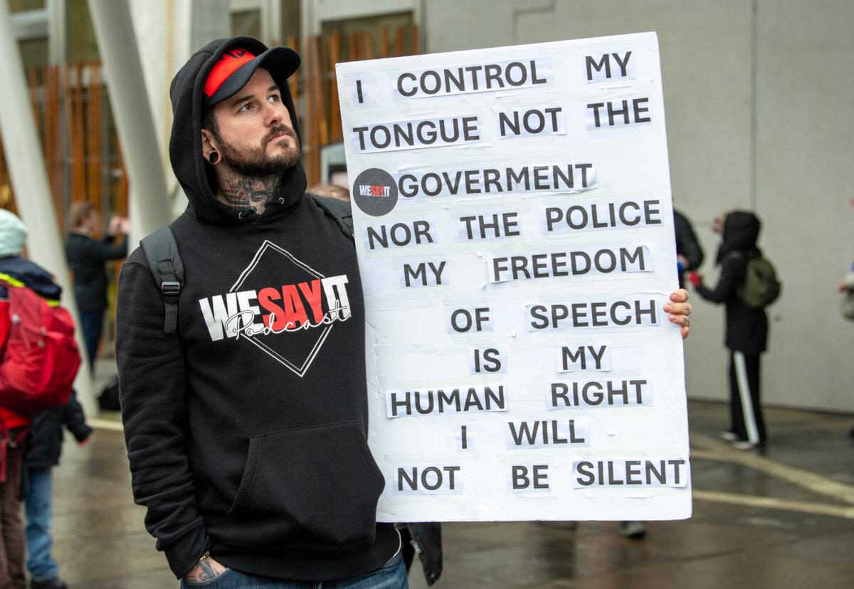 Campaigners gather outside the Scottish Parliament at Holyrood in Edinburgh, to mark the introduction of the Hate Crime and Public Order (Scotland) Act, on April 1, 2024. (Lesley Martin/PA)