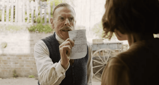 Edward Swan (Timothy Spall) confronting Rose (Jessie Buckley), in “Wicked Little Letters.” (Studiocanal/Sony Pictures Classics)