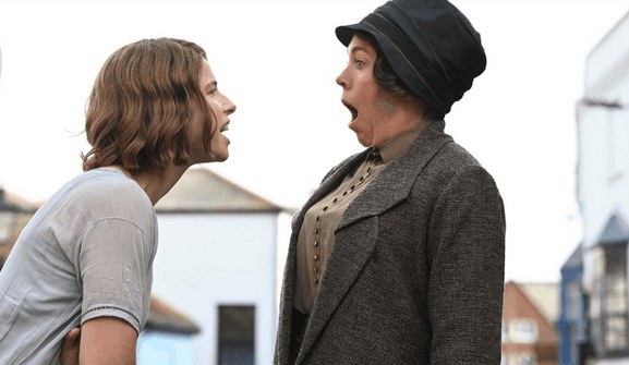 Rose Gooding (Jessie Buckley, L) and Edith Swan (Olivia Colman), in "Wicked Little Letters." (Studiocanal/Sony Pictures Classics)