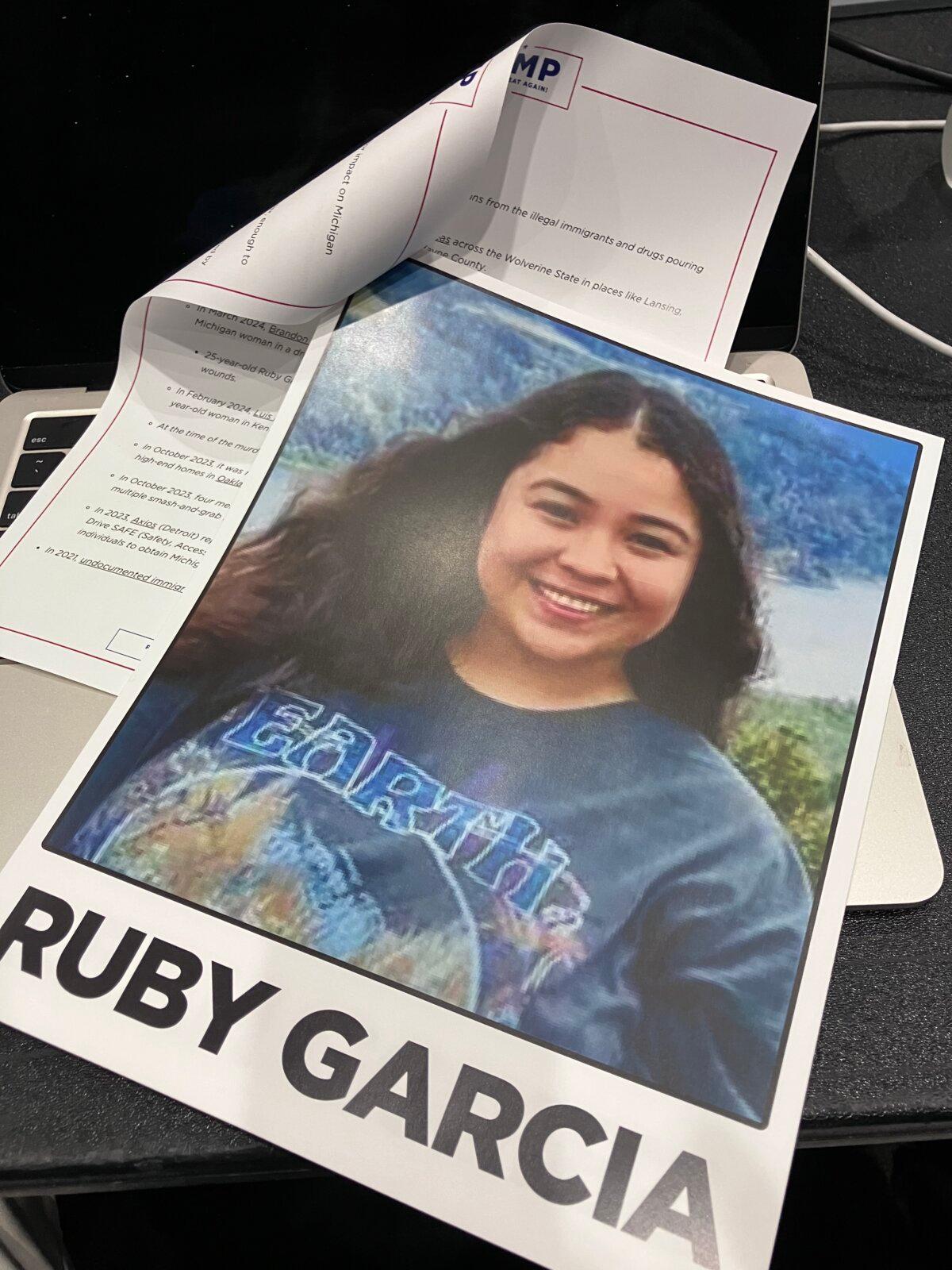 A handout from former President Donald Trump's campaign displayed a photograph of Ruby Garcia, 25, of Grand Rapids, Mich., as an example of a killing allegedly committed by an illegal immigrant, at a speech in Grand Rapids on April 2, 2024. (Janice Hisle/The Epoch Times)