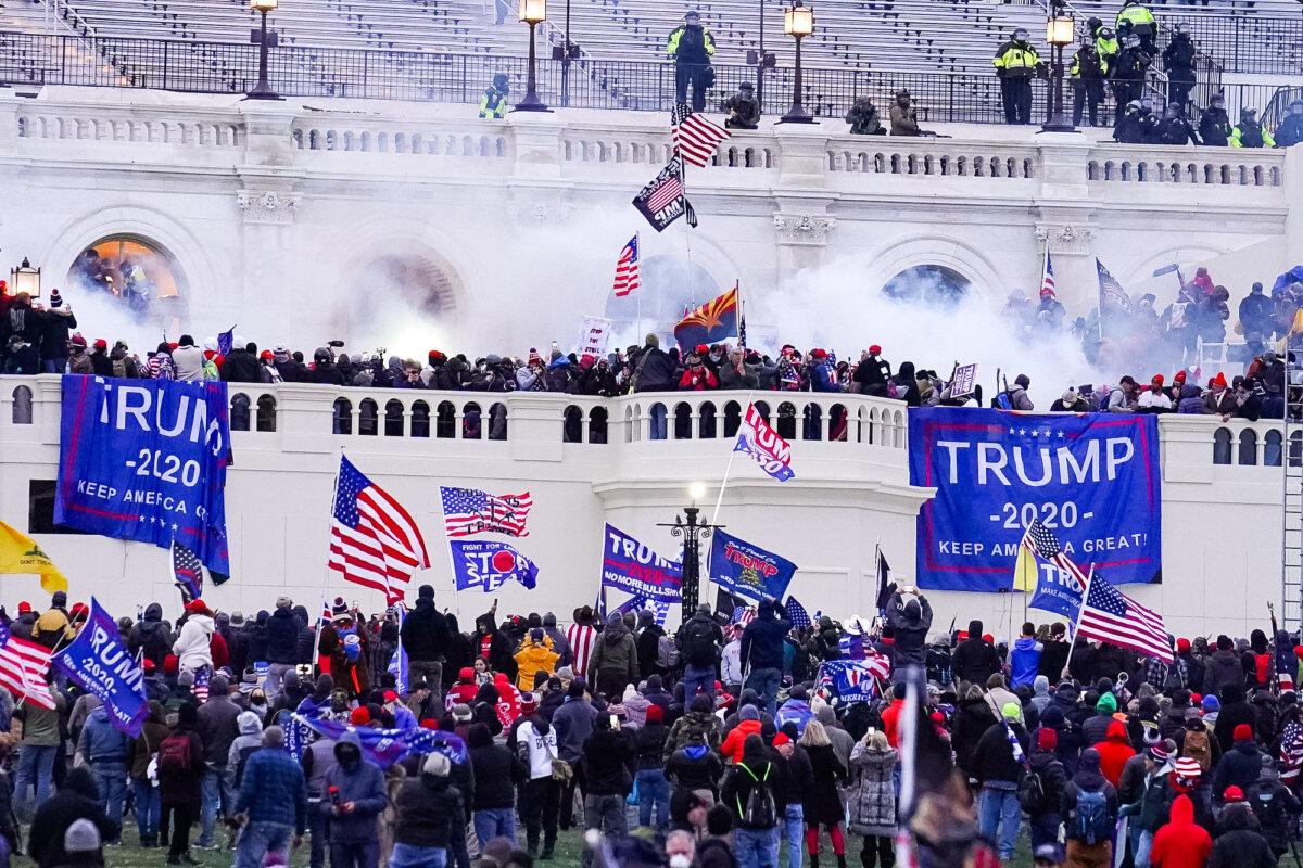 Demonstrators are seen at the U.S. Capitol in Washington on Jan. 6, 2021. (John Minchillo/AP Photo)