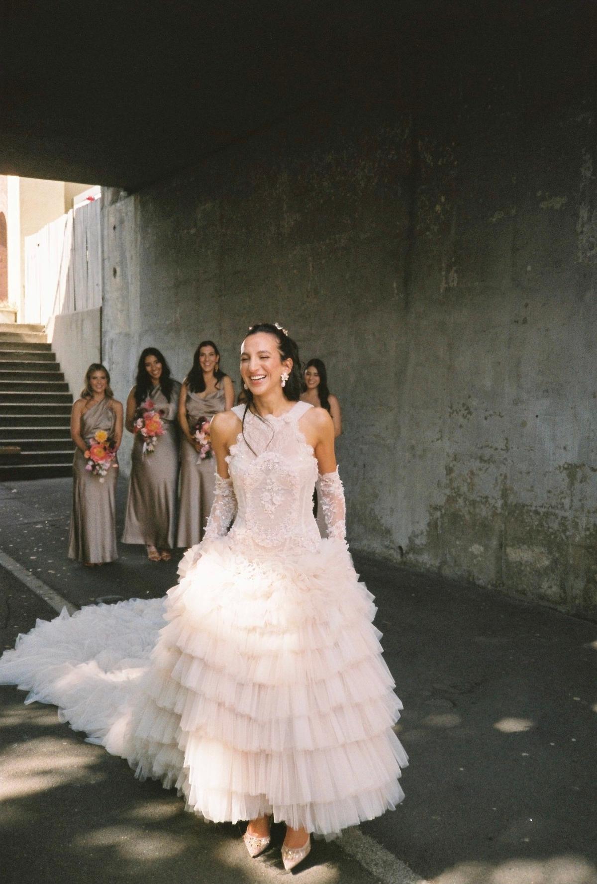 Mrs. Fernandez with her bridesmaids in the background. (Courtesy of Anemotion via <a href="https://www.instagram.com/jasmyn/">Jasmine Fernandez</a>)