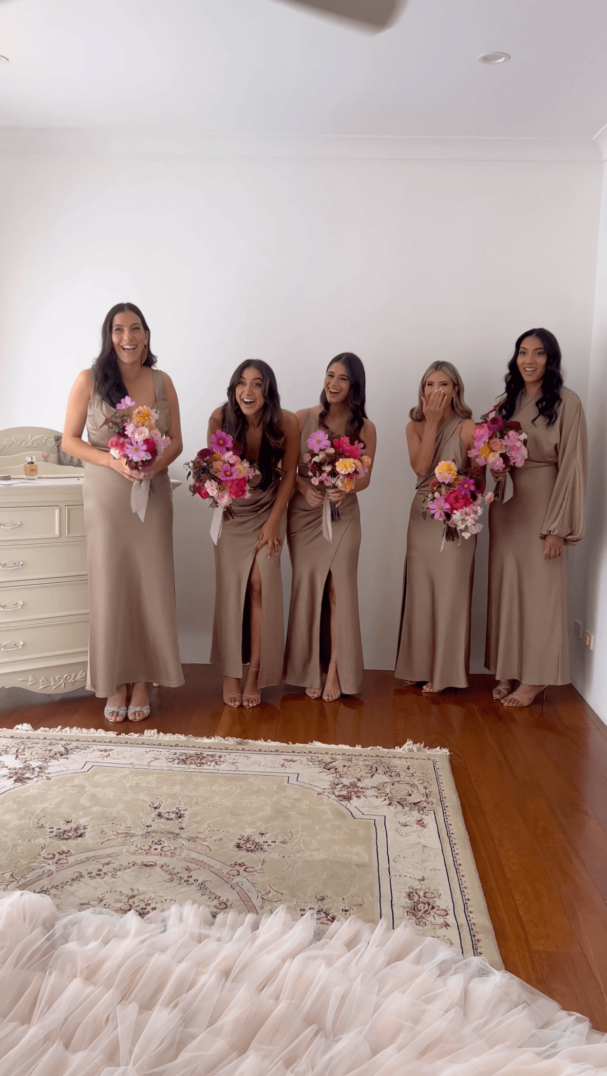 Mrs. Fernandez's bridesmaids on seeing her wedding dress for the first time. (Courtesy of <a href="https://www.instagram.com/jasmyn/">Jasmine Fernandez</a>)