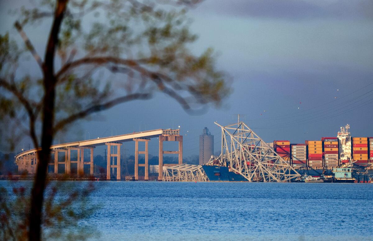 Salvage personal work to clear debris from the Francis Scott Key Bridge in Baltimore, Md., on April 4, 2024. (Kevin Dietsch/Getty Images)