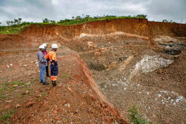 US Authorities Target Southern Africa’s Officials, Businesses Over Gold Smuggling 2 Workers inspect an open cast at Arcadia Lithium mine in Goromonzi, Zimbabwe, on Jan. 11, 2022. The Chinese firm Zhejiang Huayou Cobalt acquired the hard-rock lithium mine for more than $400 million in April 2022. (Tafadzwa Ufumeli/Getty Images)
