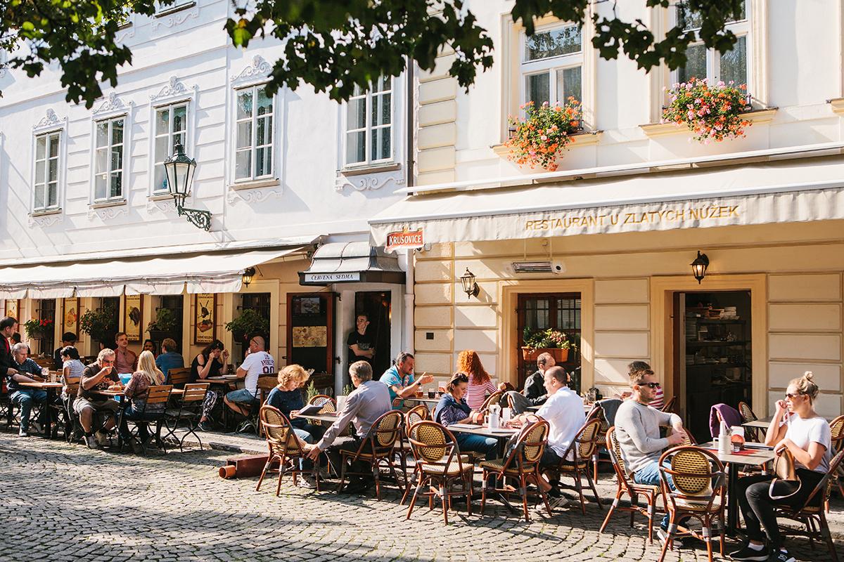 On a sunny day, locals and tourists alike flock to the many outdoor cafes that make up the city's vibrant food scene. (franz12/Shutterstock)