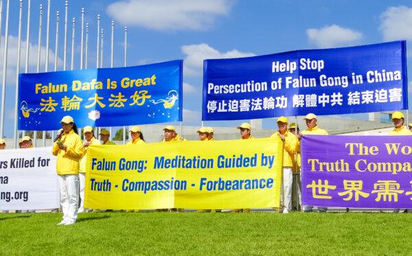 Liu Li, whose family members in China were arrested for their spiritual belief, speaks at a rally held by Falun Gong practitioners in Canberra, Australia, on March 27, 2024. (The Epoch Times)