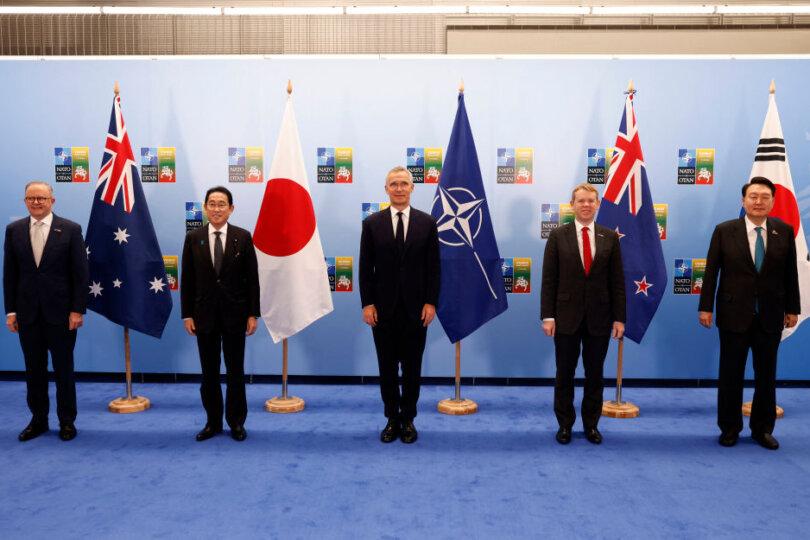 (L-R) Australia's Prime Minister Anthony Albanese, Japan's Prime Minister Fumio Kishida, NATO Secretary General Jens Stoltenberg, New Zealand's Prime Minister Chris Hipkins, and South Korea's President Yoon Suk Yeol pose for a family photo prior to a meeting of the North Atlantic Council (NAC) with Asia Pacific partners during the NATO Summit in Vilnius, Lithuania, on July 12, 2023. (Odd Andersen/AFP via Getty Images)
