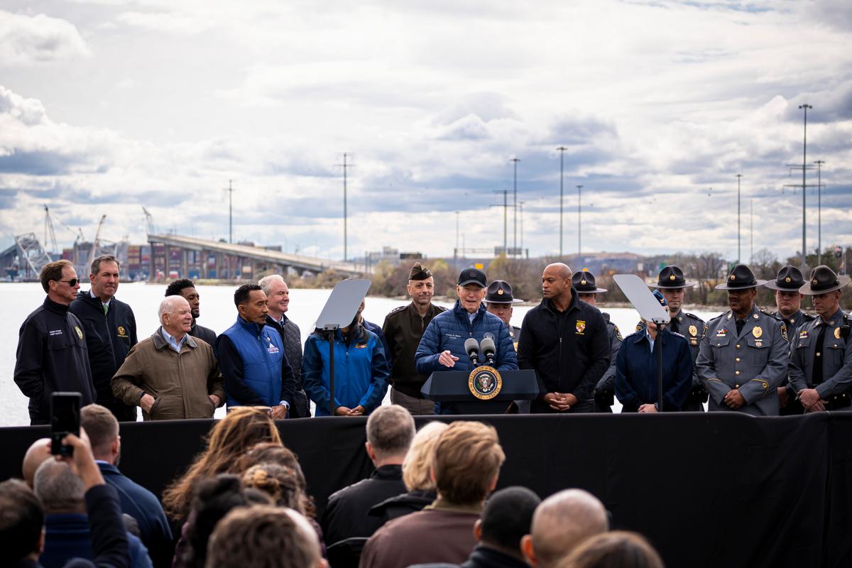 President Joe Biden (C) speaks about the restoration of the Francis Scott Key Bridge at the Maryland Transportation Authority Police headquarters in Baltimore on April 5, 2024. (Madalina Vasiliu/The Epoch Times)