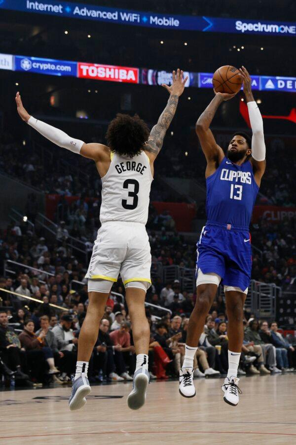 Los Angeles Clippers forward Paul George (13) shoots a 3-pointer against Utah Jazz guard Keyonte George (3) during the first half of an NBA basketball game in Los Angeles on April 5, 2024. (Etienne Laurent/AP Photo)