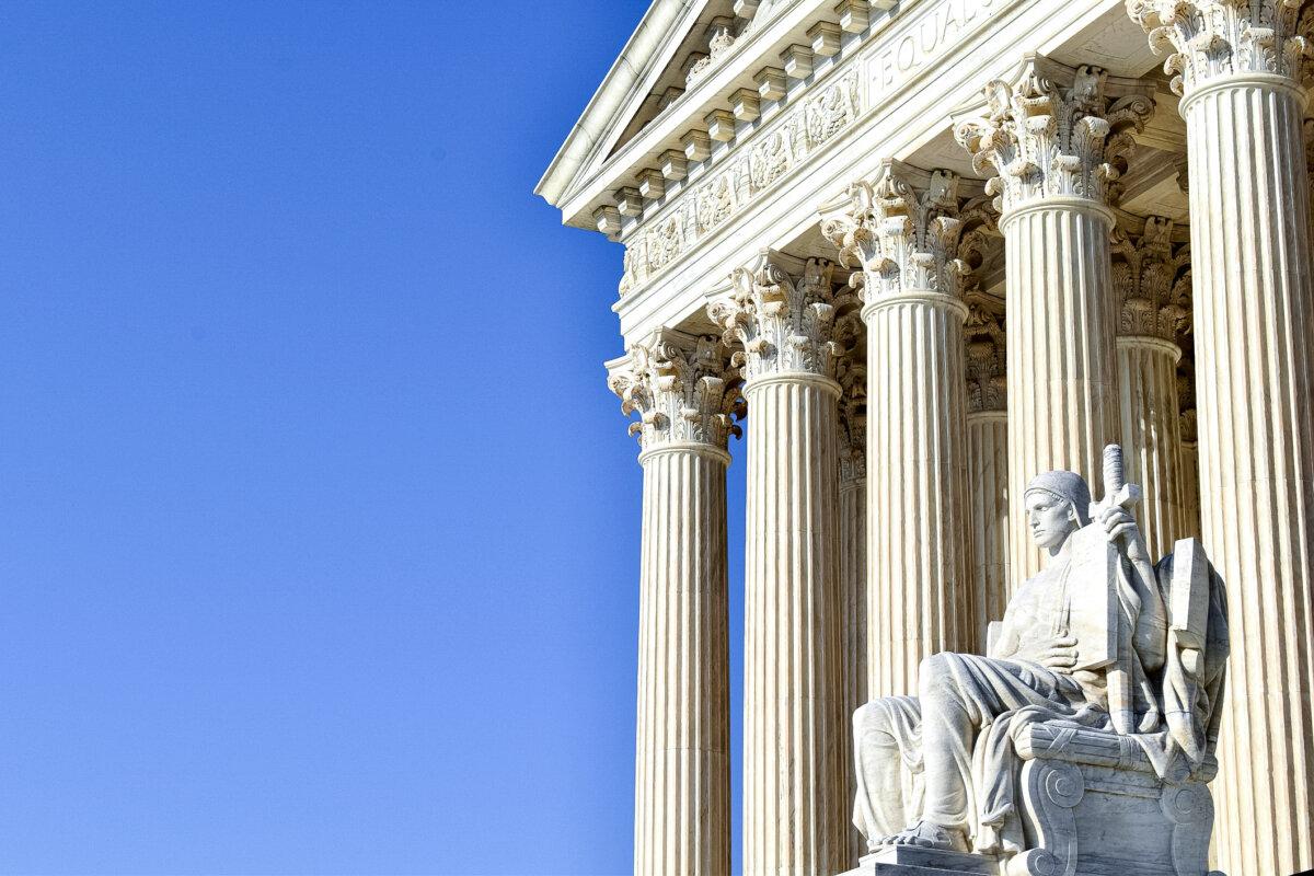 A sculpture known as the 'Guardian or Executor of Law' sits in front of the U.S. Supreme Court building in this undated photograph. (Perry Spring/iStock/Getty Images Plus)