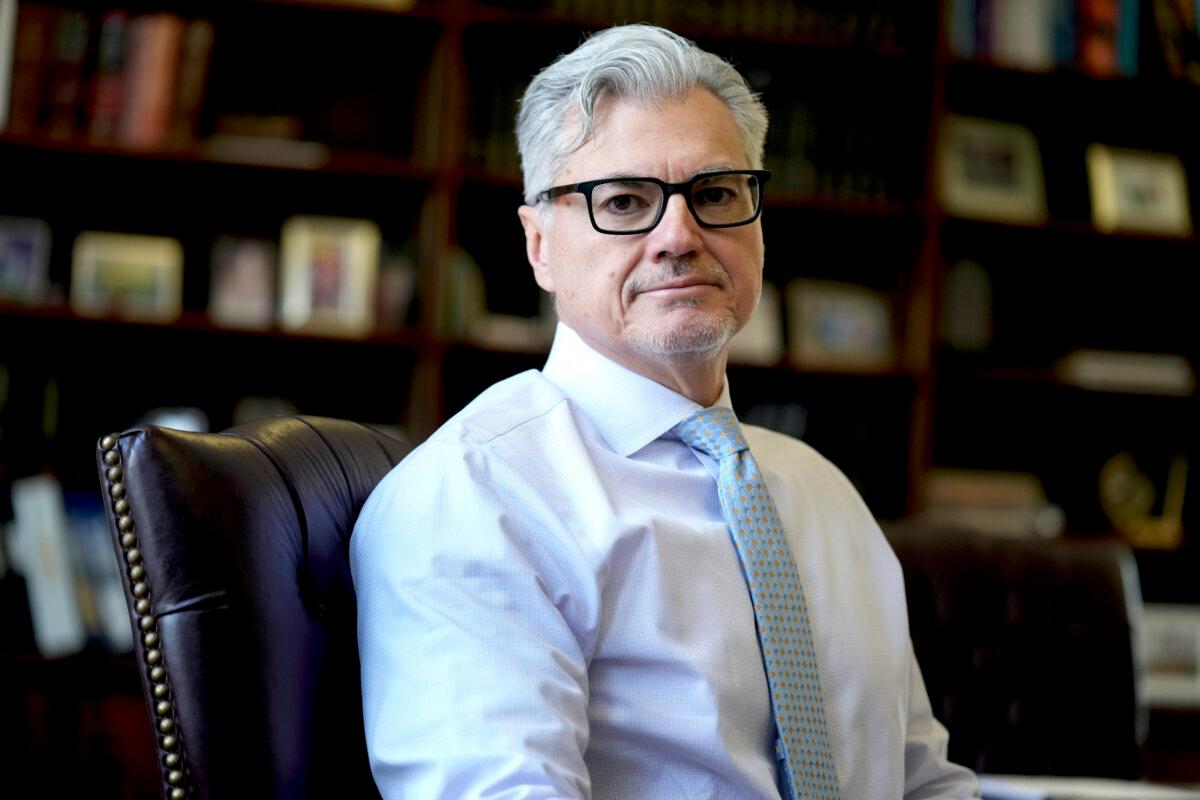 Judge Juan M. Merchan poses in his chambers in New York on March 14, 2024. (Seth Wenig/AP Photo)