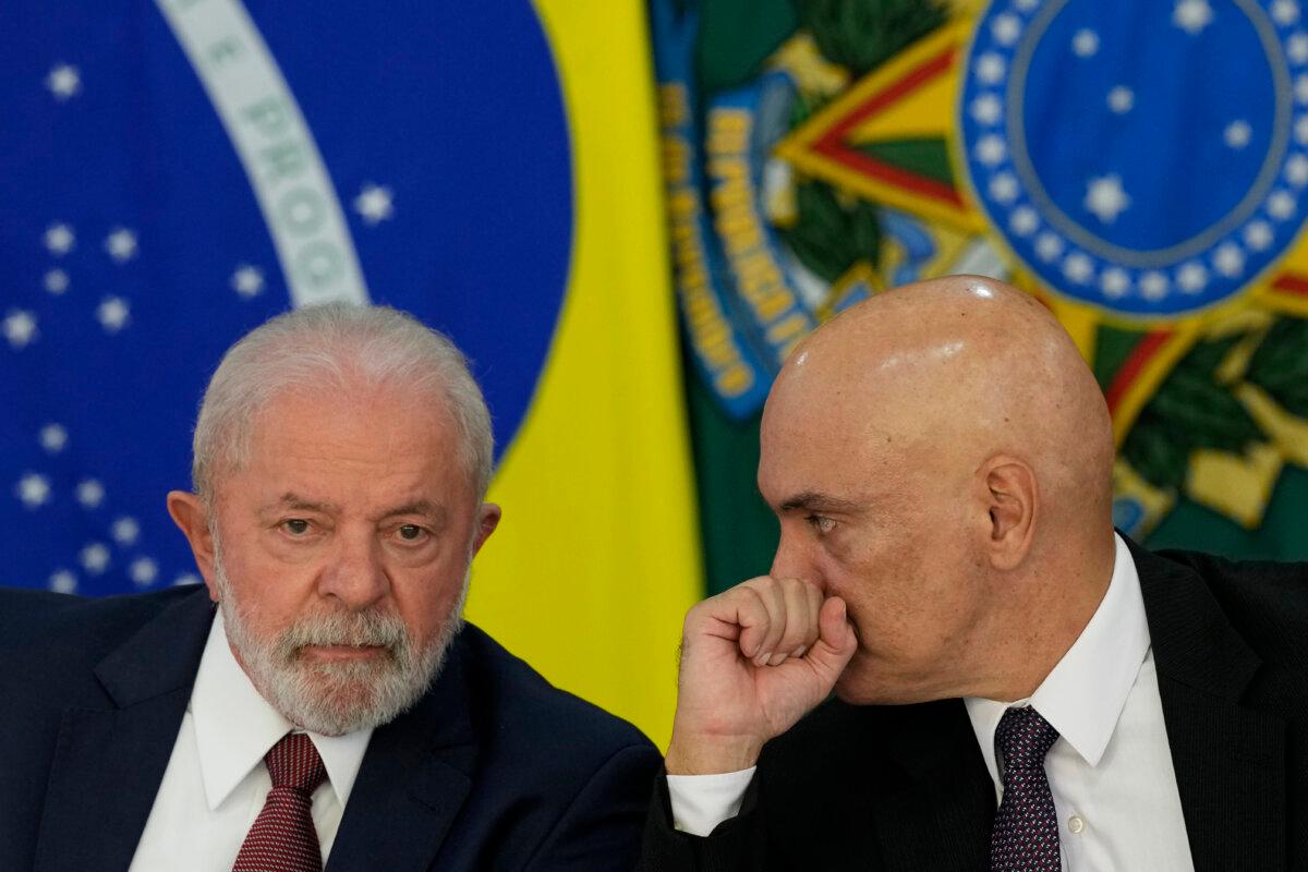 Brazil's President Luiz Inácio Lula da Silva (L) and Supreme Court Justice Alexandre de Moraes attend a meeting at the Planalto Palace in Brasilia, Brazil, on April 18, 2023. (Eraldo Peres/AP Photo)