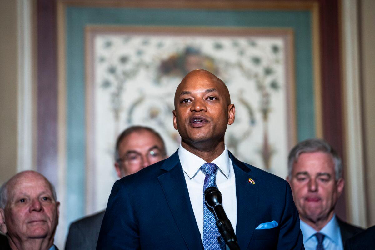 Maryland Gov. Wes Moore (C) and lawmakers speak during a news conference about rebuilding the Francis Scott Key Bridge, at the U.S. Capitol on April 9, 2024. (Madalina Vasiliu/The Epoch Times)