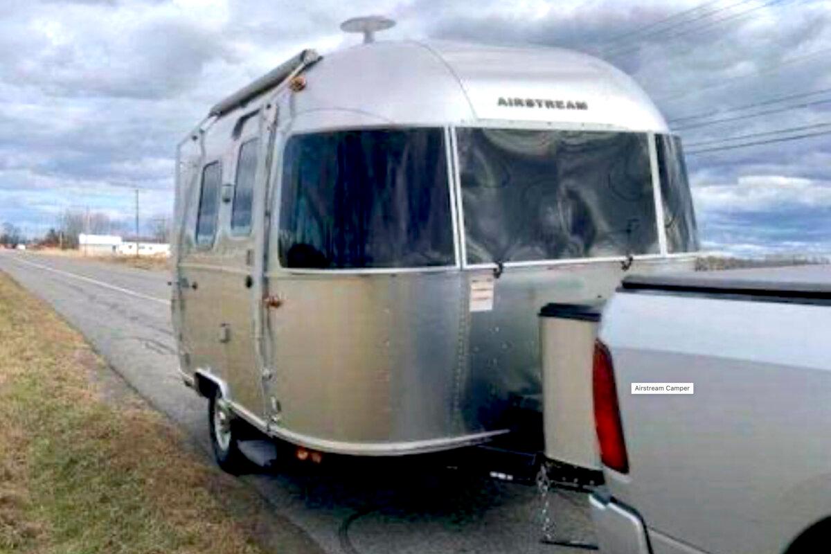 An Airstream trailer in Brownville, N.Y. Monika Woroniecka, a Long Island doctor, who was headed to upstate New York to see the solar eclipse with her family, fell out of the moving trailer on a highway and died on April 6, 2024, authorities said. (New York State Police via AP)