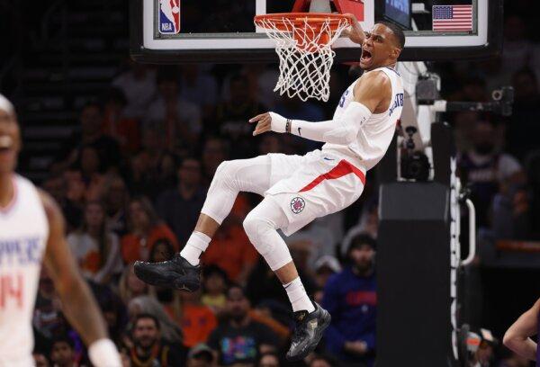 Russell Westbrook (0) of the LA Clippers reacts after a slam dunk against the Phoenix Suns during the first half of the NBA game in Phoenix on April 9, 2024. (Christian Petersen/Getty Images)