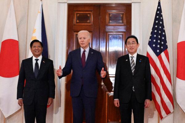 U.S. President Joe Biden (C) speaks to the press with Japanese Prime Minister Fumio Kishida (R) and Filipino President Ferdinand Marcos Jr. (L) at the White House on April 11, 2024. (Andrew Caballero-Reynolds/AFP via Getty Images)