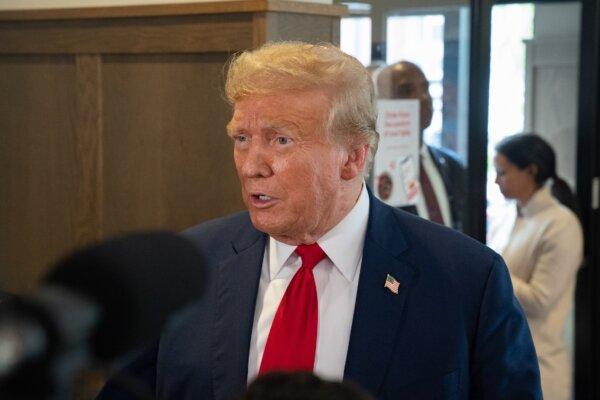 Presumptive GOP nominee former President Donald Trump speaks to the media during a visit to a Chick-fil-A restaurant in Atlanta on April 10, 2024. (Megan Varner/Getty Images)