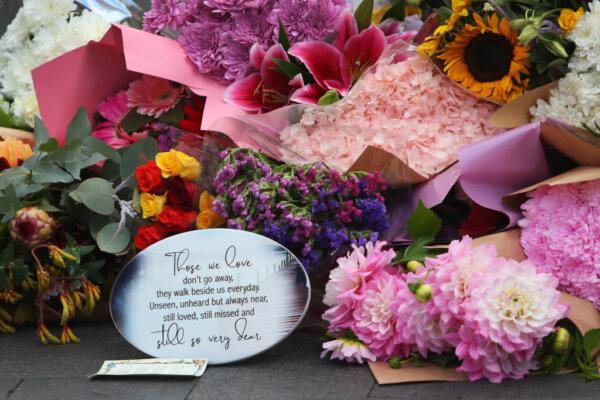 Flower tributes are seen at Oxford Street Mall alongside Westfield Bondi Junction in Sydney, Australia, on April 14, 2024. (Lisa Maree Williams/Getty Images)