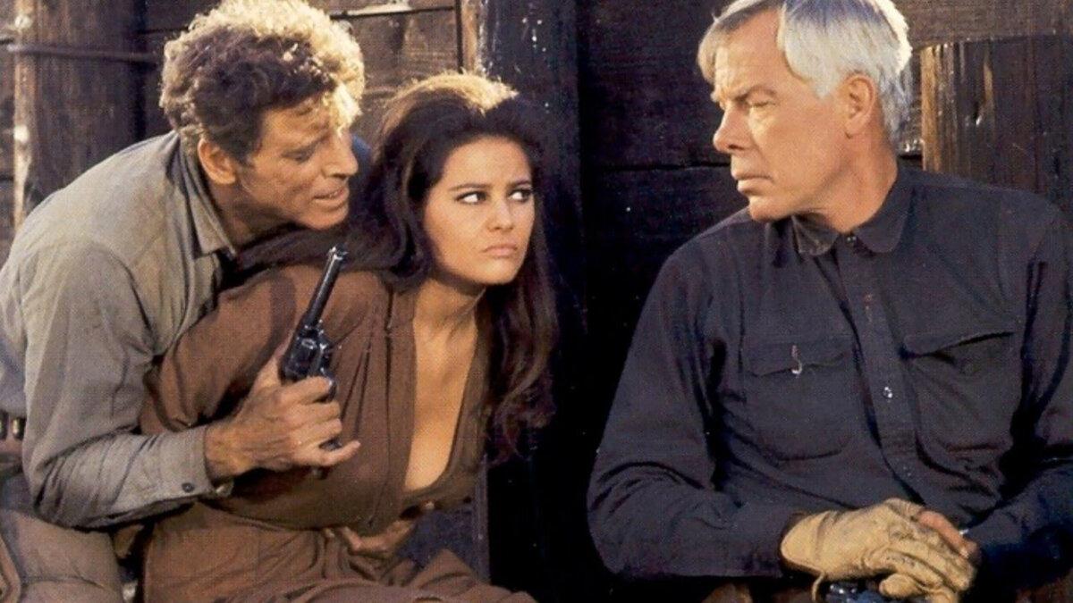 On the run (L–R) Dolworth (Burt Lancaster), Maria (Claudia Cardinale), and Fardan (Lee Marvin), in “The Professionals.” (Columbia Pictures)