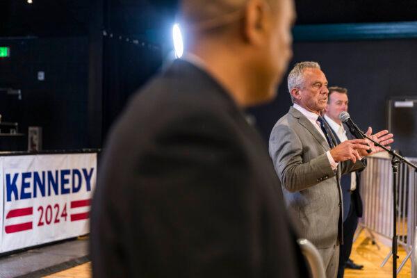 Robert F. Kennedy Jr. talks to reporters after his rally in West Des Moines, Iowa, on April 13, 2024. (Kathryn Gamble for The Epoch Times)