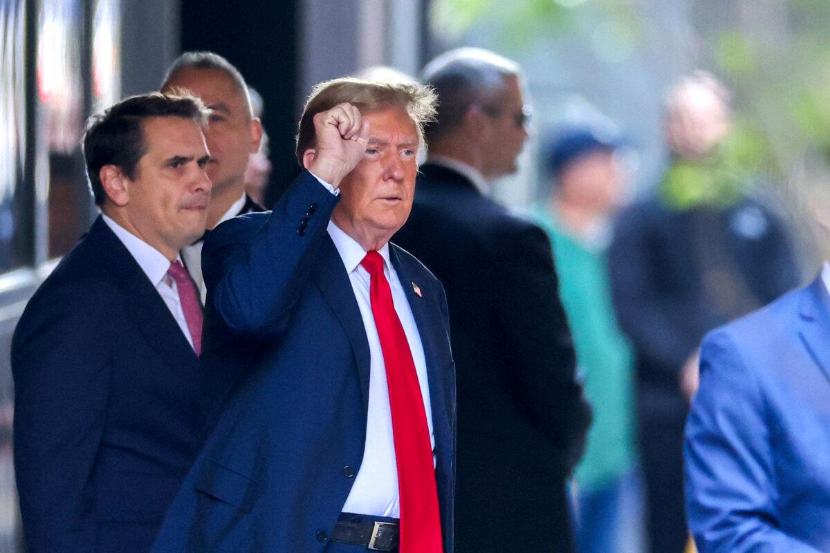 Former President Donald Trump departs Trump Tower for Manhattan Criminal Court to attend the first day of his trial for allegedly covering up hush money payments linked to extramarital affairs in New York City on April 15, 2024. (Charly Triballeau/AFP via Getty Images)