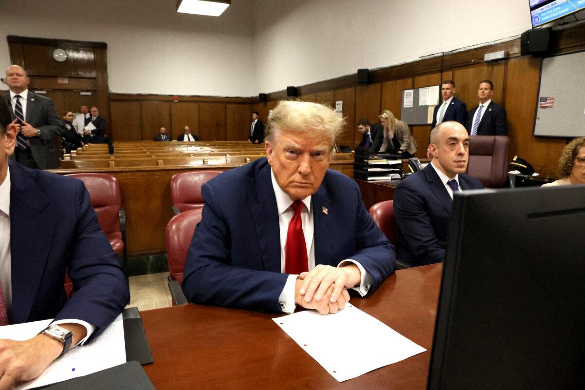 Former President Donald Trump attends the first day of his trial for allegedly covering up hush money payments linked to extramarital affairs, at Manhattan Criminal Court in New York City on April 15, 2024. (Jefferson Siegel/Pool/AFP via Getty Images)