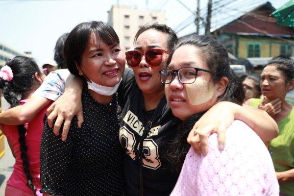 Released prisoners are welcomed by family members and colleagues after they were released Insein Prison in Yangon, Burma, on April 17, 2024. (Thein Zaw/AP Photo)