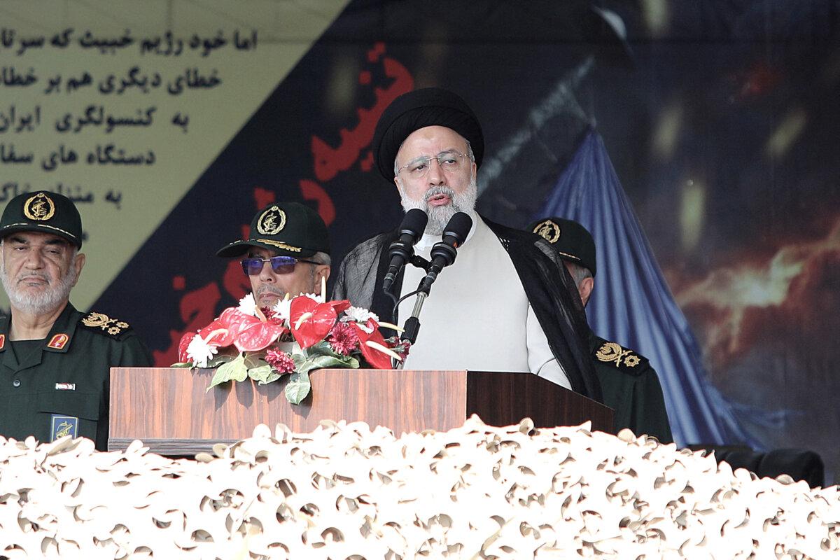 Iran's President Ebrahim Raisi attends a military parade alongside high-ranking officials and commanders during a ceremony marking the country's annual army day in Tehran on April 17, 2024. (Atta Kenare/AFP via Getty Images)