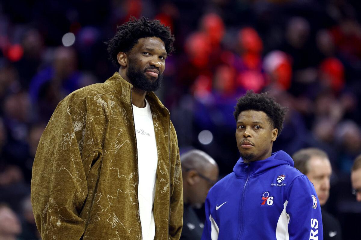 Joel Embiid #21 and Kyle Lowry #7 of the Philadelphia 76ers look on during the fourth quarter at the Wells Fargo Center in Philadelphia, Pa., on March 8, 2024. (Tim Nwachukwu/Getty Images)