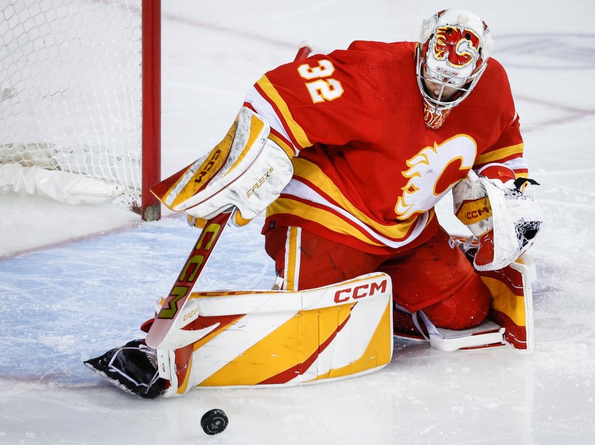 Wolf, Flames Beat Sharks in NHL-First Game Matching California-Born Goalies