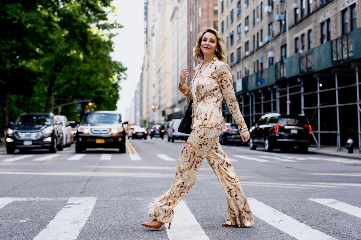 Ms. Bernay wears an ivory-colored blazer and matching pants in an elegant paisley print. (Samira Bouaou for American Essence)
