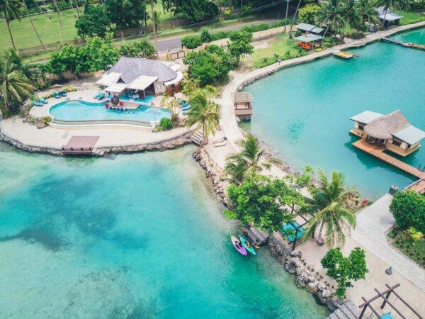 The Aerial Lagoon is a stunning natural feature characterized by crystal-clear turquoise waters surrounded by greenery. (Courtesy of Koro Sun Resort)