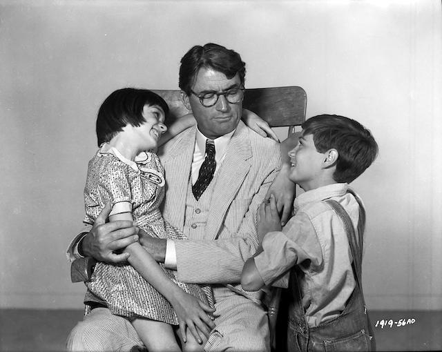 Peck as Atticus Finch with Mary Badham (Jean Louise “Scout” Finch) and Phillip Alford (Jem Finch) in the 1963 film “To Kill a Mockingbird.” (Brentwood Productions)