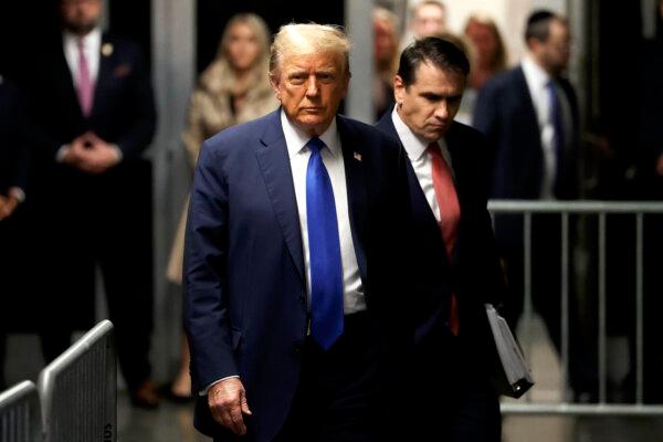 Former U.S. President Donald Trump arrives in court with attorney Todd Blanche (R) for opening statements in his trial at Manhattan Criminal Court on April 22, 2024 in New York City. (Yuki Iwamura-Pool/Getty Images)