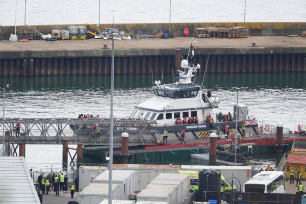 A group of people thought to be illegal immigrants are brought in to Dover, Kent, by the Border Force on April 23, 2024. (Gareth Fuller/PA Wire)