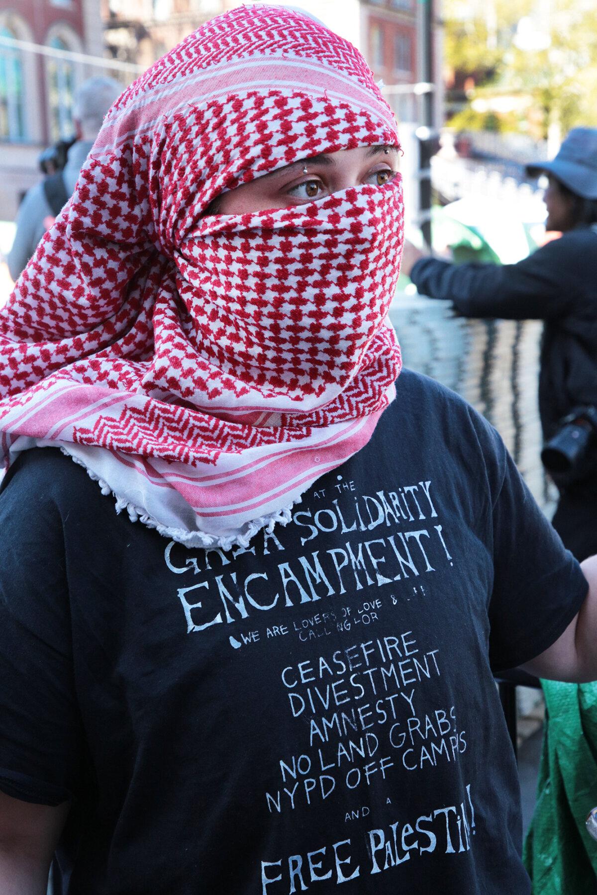 A pro-Palestinian protester in the encampment on the Columbia University campus in New York City. (Richard Moore/The Epoch Times)