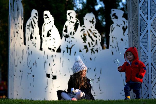 The ATSIVSA ceremony at “For Our Country” Aboriginal and Torres Strait Islander memorial is held after the Dawn Service at the Australian War Memorial in Canberra, Australia, on April 25, 2024. (Tracey Nearmy/Getty Images)