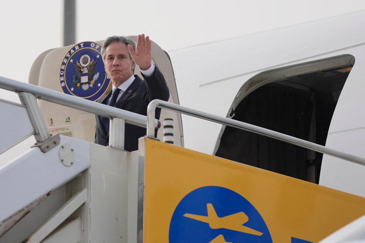 U.S. Secretary of State Antony Blinken waves upon arriving from Shanghai, at Beijing Capital International Airport in Beijing on April 25, 2024. (Mark Schiefelbein/POOL/AFP via Getty Images)