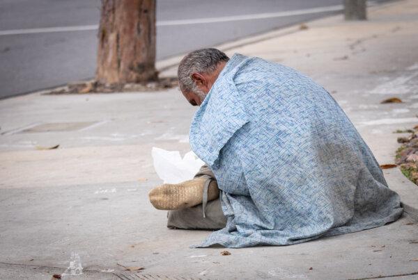 A homeless individual in Santa Ana, Calif., on April 23, 2024. (John Fredricks/The Epoch Times)